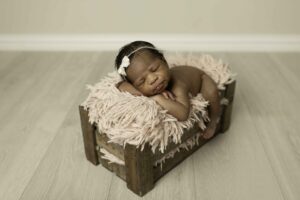 Chunky Monkey Newborn Baby Girl in Studio in a box