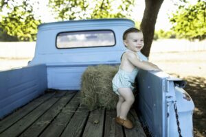 Birthday Boy with old blue truck 