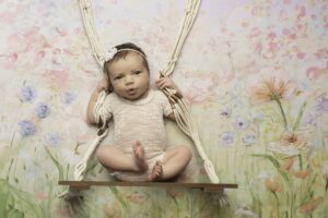 Newborn Baby Girl on a swing