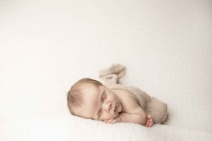 Newborn Baby Boy on white blanket