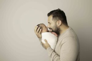 Fort Worth Newborn Baby Girl posed with dad 