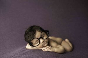 Newborn Baby Girl with glasses 