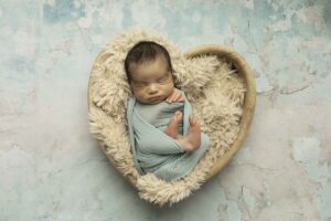 Newborn Baby Boy in heart prop
