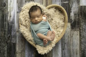 Newborn Baby Boy in heart prop