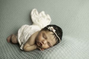 Newborn Baby Girl with white wrap 