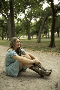 Senior Session with Girl in Fort Worth  at Trinity Park  with boots 
