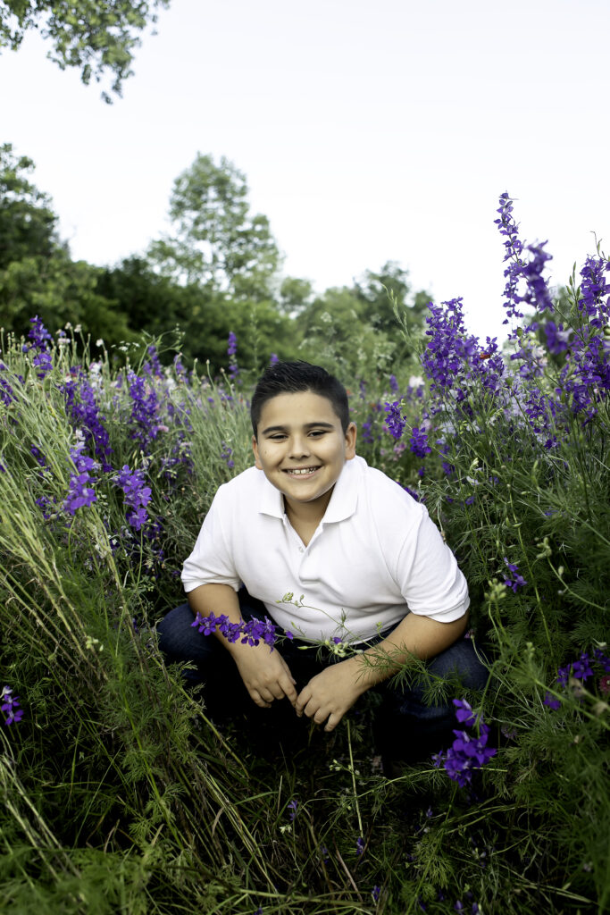 A serene and peaceful photoshoot surrounded by colorful wildflowers in Richardson, TX, captured with love by Chunky Monkey Photography