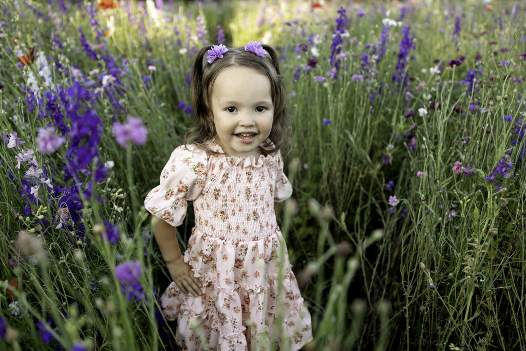 A serene wildflower photoshoot in Richardson, TX, capturing natural beauty and vibrant colors, photographed by Chunky Monkey Photography.