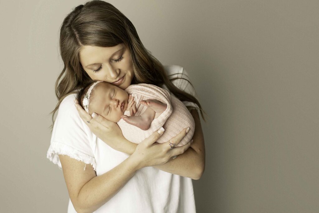 Mom and dad share a quiet, affectionate moment together, capturing their bond in a beautiful family photo by Chunky Monkey Photography