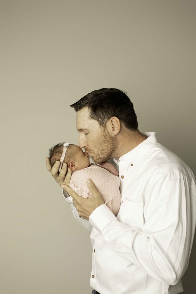 A beautiful, peaceful moment between mom and dad, radiating love and connection, beautifully captured by Chunky Monkey Photography