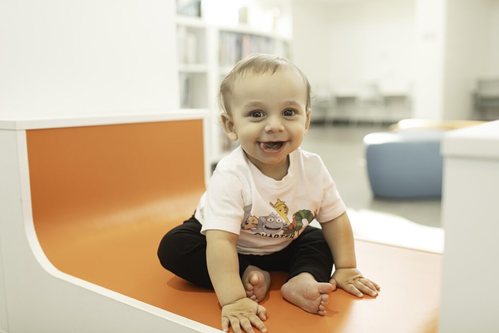 Celebrate a 1st birthday at the Library in Fort Worth, TX, with a photoshoot that captures your little one's curiosity and joy in an atmosphere of books and knowledge