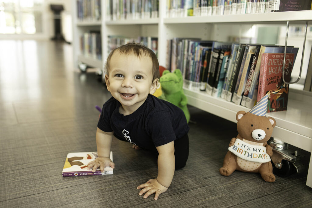 A 1st birthday photoshoot at the Library in Fort Worth, TX, captures a little one’s milestone surrounded by books, creating a meaningful and adorable memory in a cozy setting