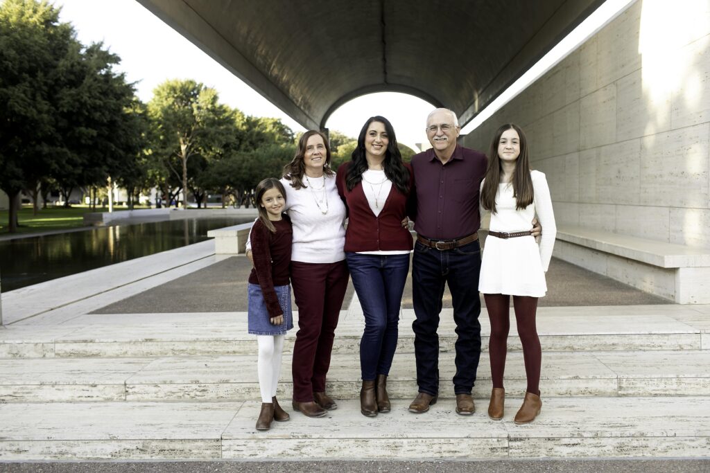 Family posing together at the Kimball Art Museum, capturing artistic moments and family connections during a Chunky Monkey Photography session