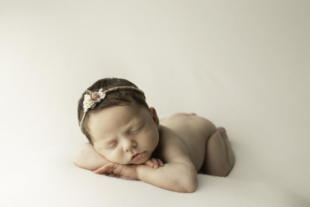 dorable single newborn captured in a serene and peaceful pose