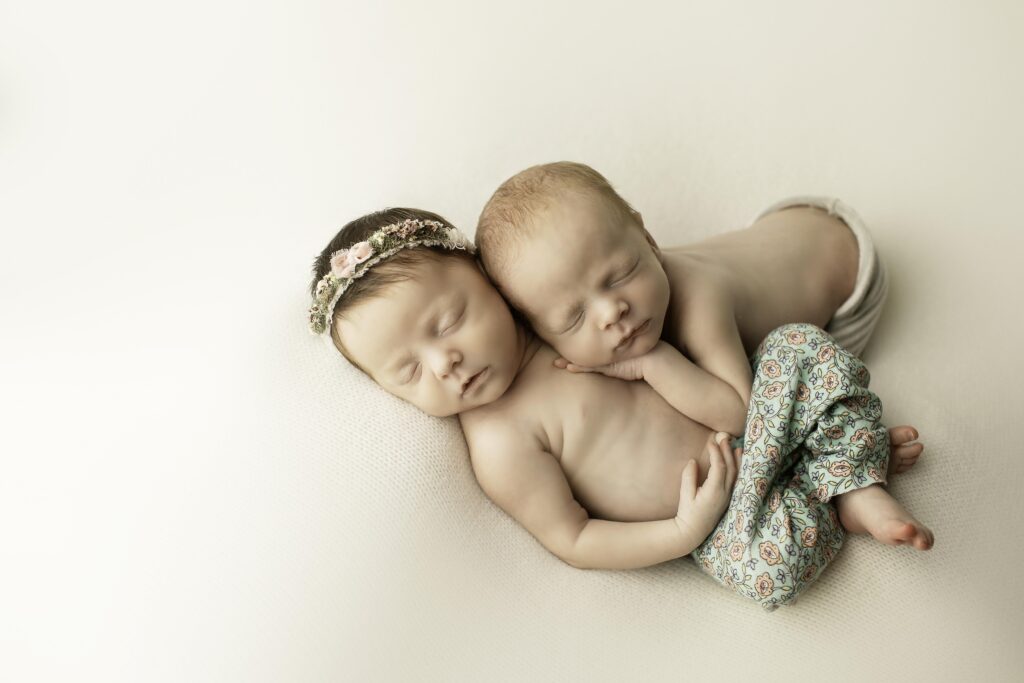 Newborn twin session with soft blankets